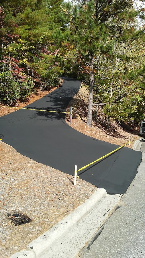Affordable sealcoating and repairs photo