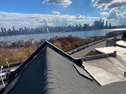 Elite Work Home Improvement & Roofing Roofing Repair photo
