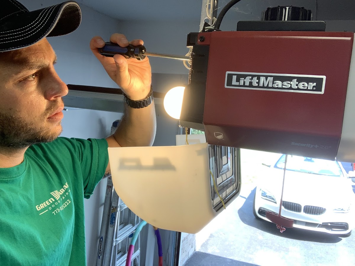 Green Garage Door Repair Handyman photo