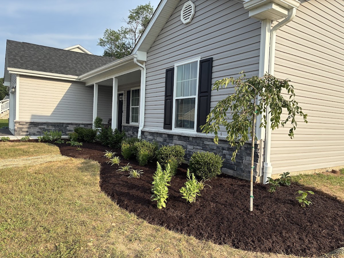 Cornerstone Lawn Services Landscaper photo