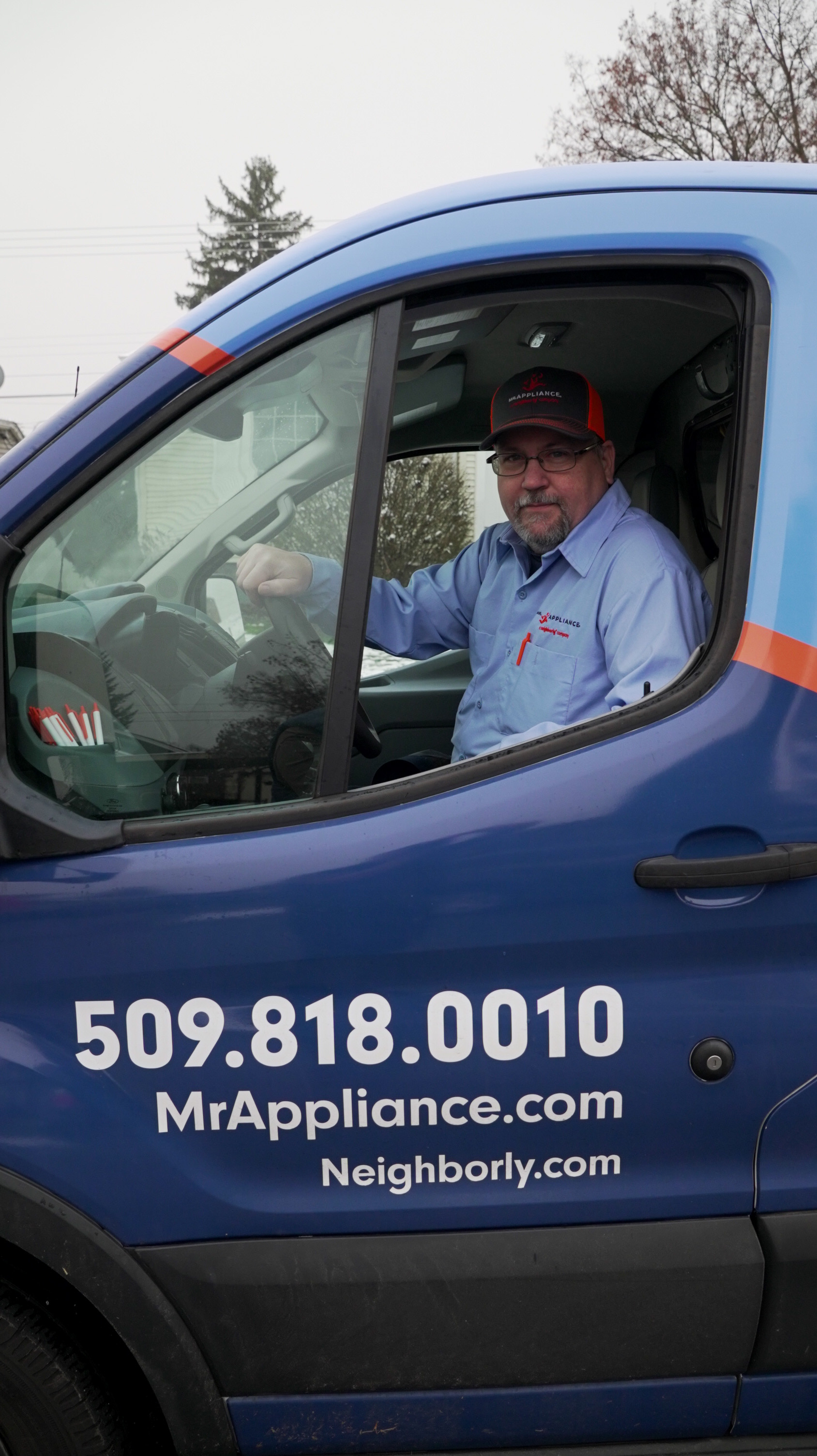 Robert Harris in the Mr. Appliance of Spokane Valley Van supporting Veterans in Fairchild Air Force Base - Mr. Appliance of Spokane Valley A