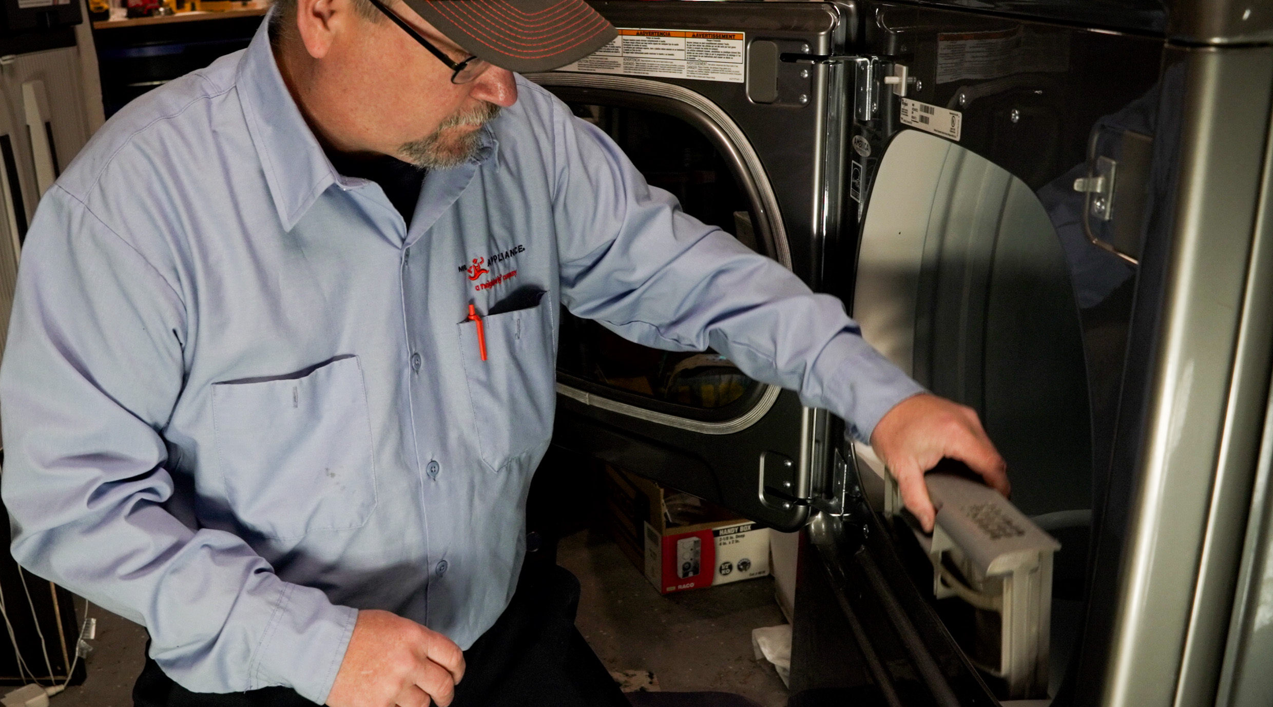 Mr. Appliance Servicing a Dryer in Town and Country - Mr. Appliance of Spokane Valley Appliance Repair in Spokane Valley, WA photo