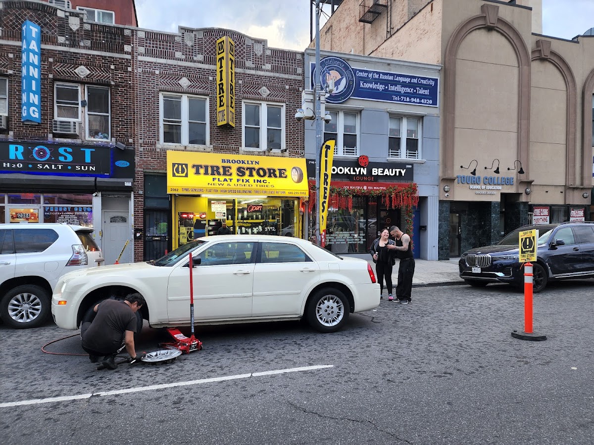 BROOKLYN TIRE SHOP. FLAT FIX. ROAD SERVICE . OPEN LATE 11:45PM