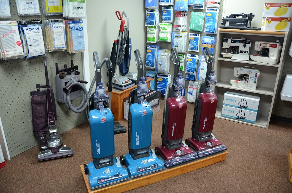 Mann's Sewing Machine and Sweeper